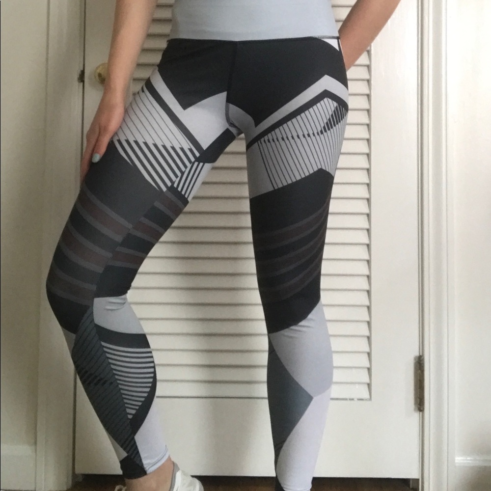 Black, grey, and white athletic leggings